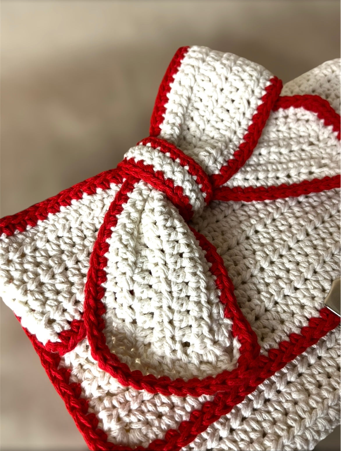 Borsa pochette “FIOCCO”